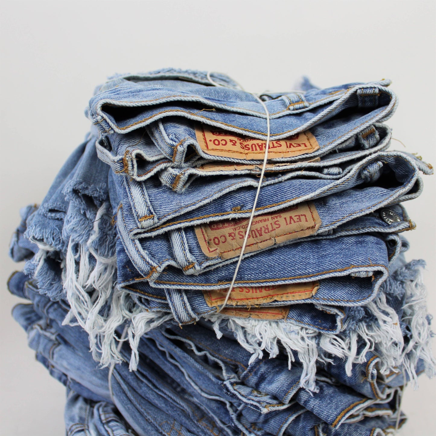 Low-Rise Upcycled Denim Cutoff Shorts - Frayed